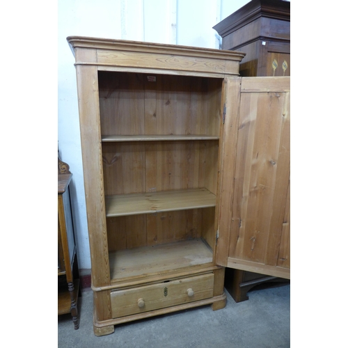 283 - A 19th Century French pine single door housekeeper's cupboard