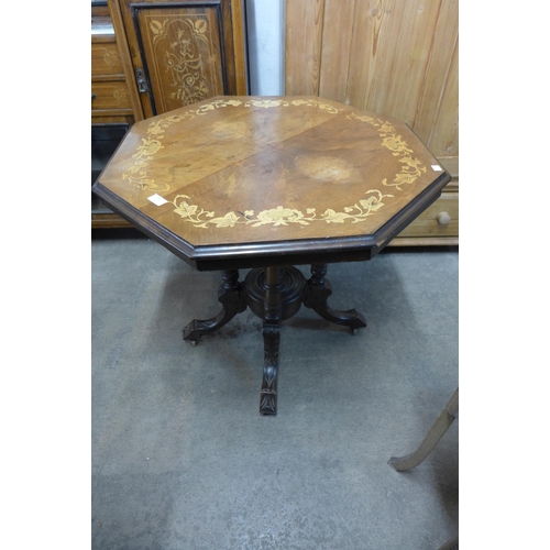 293 - A Victorian inlaid walnut octagonal centre table