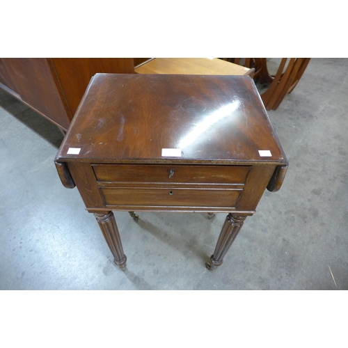 30 - A George IV mahogany drop leaf two drawer night stand