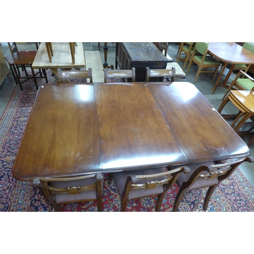 34a - A Victorian mahogany extending dining table and six Regency style chairs, table dimensions; 72cms h,... 