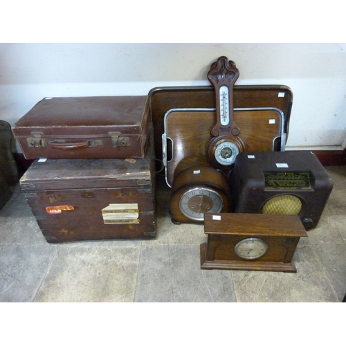 437 - Two mantel clocks, a barometer, two trays, a small suitcase and an oak box