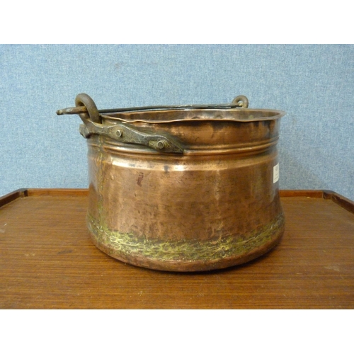 439 - A copper Arts and Crafts scuttle