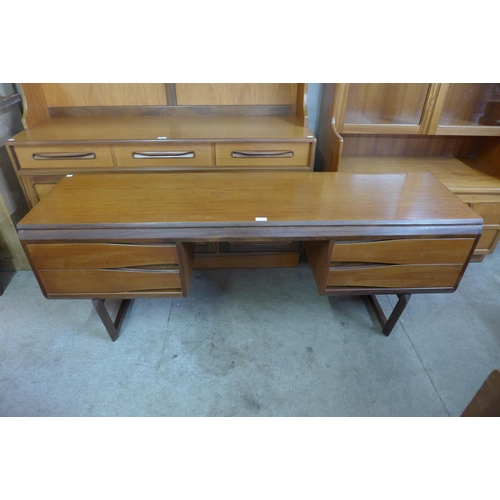 44 - A White & Newton teak dressing table