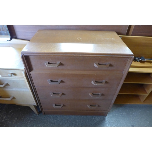 52 - A G-Plan Brandon oak three piece bedroom suite, comprising chest of drawers, dressing table and a po... 