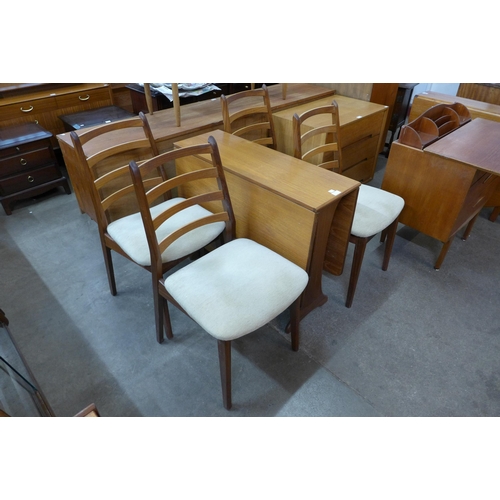 96 - A G-Plan Fresco teak drop leaf table and four chairs