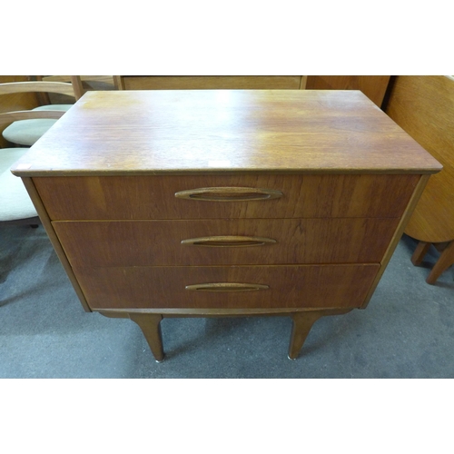 97 - A Jentique teak metamorphic writing desk/chest of drawers