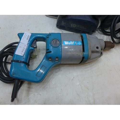 2034 - Wolf 240v electric drill with a Pro Performance 800w 240v wood plane