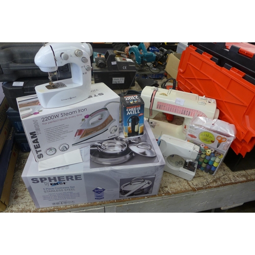 2111 - Job lot of boxed sewing machines with steam iron and  set of 5 unused pans