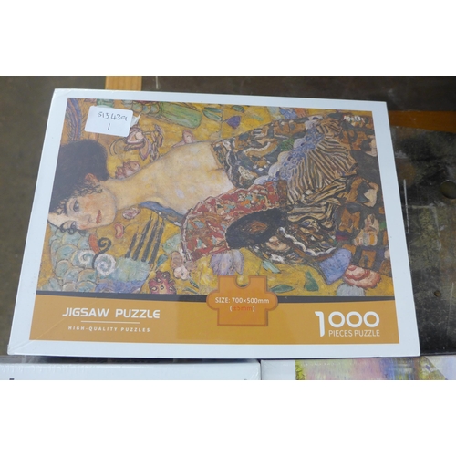 2132 - Three 1000 piece jigsaws - Art Nouveau French Lady, Stockholm Coastal Scene, Dream House (sealed)