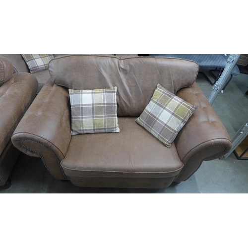 1405 - A County brown four seater sofa, two seater sofa and love seat