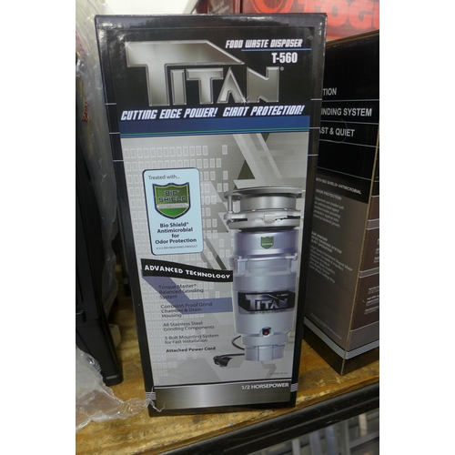 2148 - Boxed unused Titan food waste disposal unit