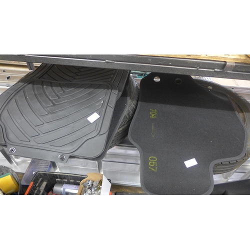 2180 - Three unused sets of car mats, unused