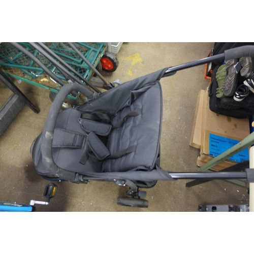 2138 - A black pushchair