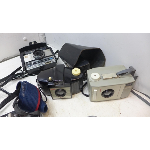 2247 - Box of cameras (includes vintage Brownie cameras and Canon Eos) plus quantity of compacts and video ... 