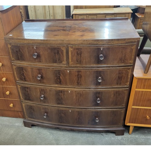 140A - An Edward VII mahogany bow front chest of drawers