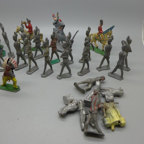 768 - Approx. 35 lead soldier 'flat' figures, a hollow-cast lead knight on horseback (a/f) & an indigenous... 