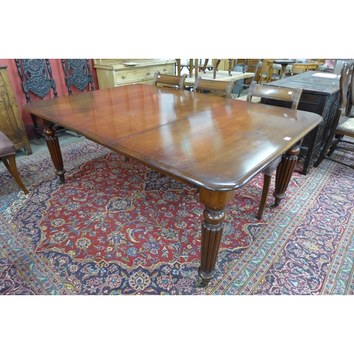 85 - A Victorian mahogany extending dining table and six Regency style chairs, table dimensions; 72cms h,... 