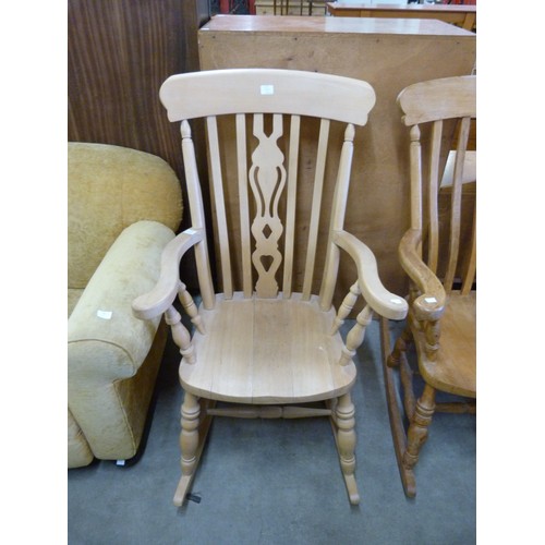 145 - A beech farmhouse rocking chair