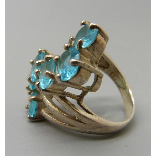 1013 - A silver and topaz ring, L