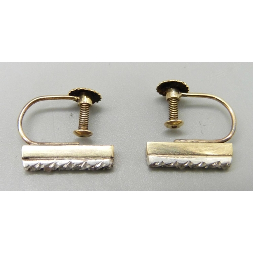 1044 - A pair of 9ct gold, rose diamond earrings with 9ct gold screw backs, each set with three diamonds