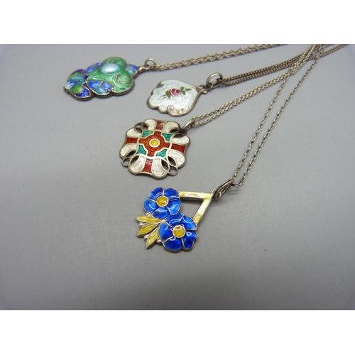 1072 - Four silver and enamel pendants, (two with red enamel a/f)