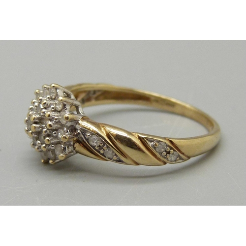 1082 - A 9ct gold and diamond ring, 2g, N