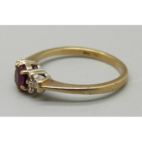 1089 - A 9ct gold, diamond and ruby ring, 1.8g, L