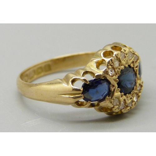 1091 - An 18ct gold, sapphire and diamond cluster ring, Birmingham 1906, 3.5g, N