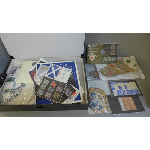 669 - Stamps; a box file of GB stamps, covers, presentation packs, etc.