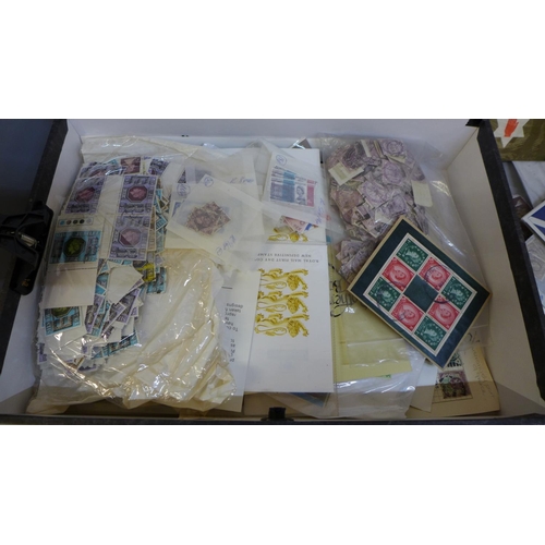 669 - Stamps; a box file of GB stamps, covers, presentation packs, etc.