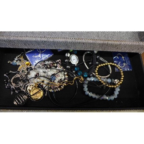 670 - A collection of costume jewellery including some silver in a jewellery box