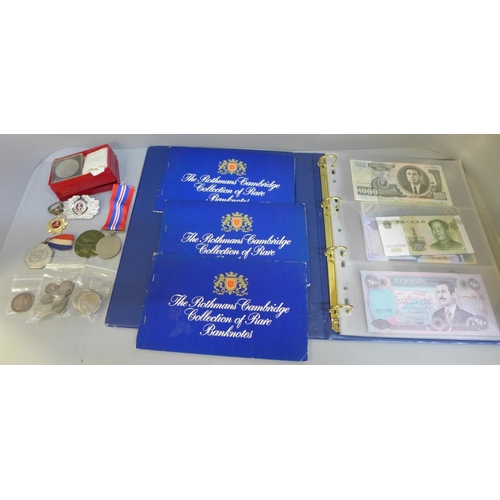 708 - A collection of foreign banknotes, commemorative coins, silver half dollar and medals and a replica ... 