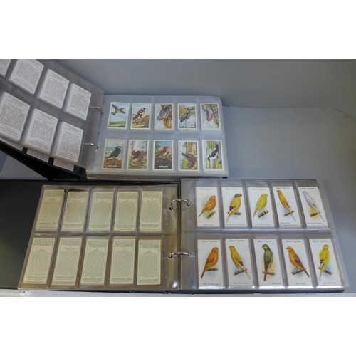 711 - Cigarette cards; two albums of cigarette cards with 22 complete sets