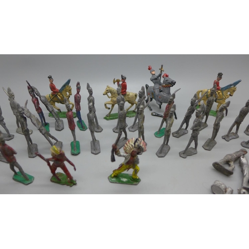 768 - Approx. 35 lead soldier 'flat' figures, a hollow-cast lead knight on horseback (a/f) & an indigenous... 