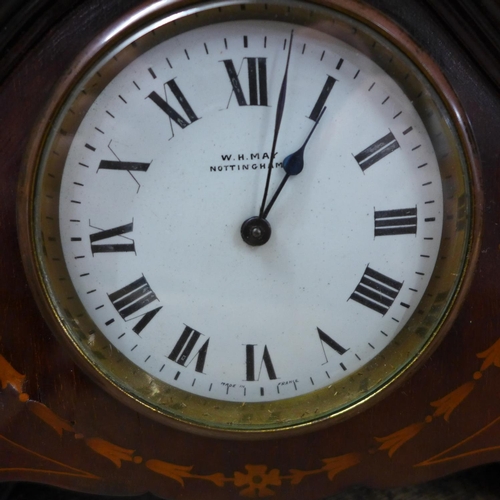 786 - A cuckoo clock and a mantel clock, the dial marked W.H. May, Nottingham