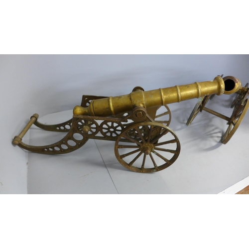 797 - A pair of model brass cannons