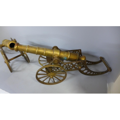 797 - A pair of model brass cannons