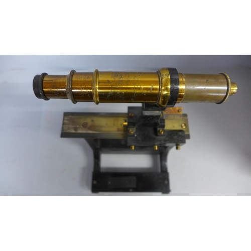 802 - A surveying tool/scope on stand, height 25cm