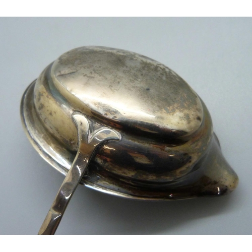 820 - A Georgian silver ladle with baleen handle, worn London hallmark