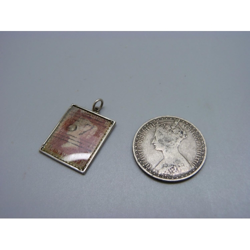 824 - A silver vinaigrette, inner cover a/f, a silver florin and a silver stamp pendant