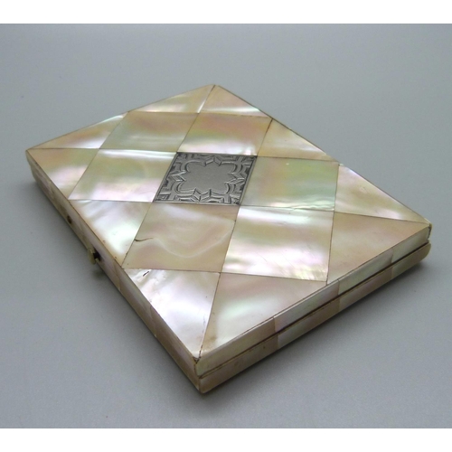 829 - A mother of pearl card case, 78mm x 108mm