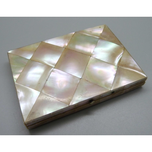 829 - A mother of pearl card case, 78mm x 108mm