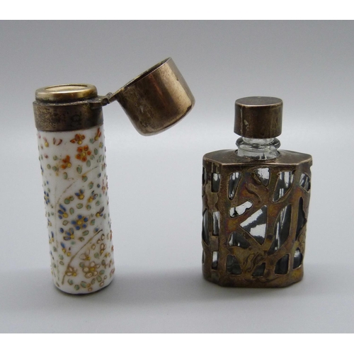 835 - A porcelain scent bottle with a white metal top, (top dented) and another silver and glass perfume b... 