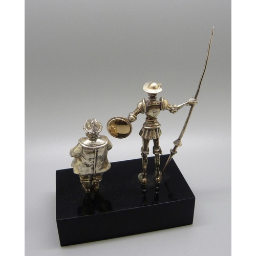 845 - A model of Don Quixote and Sancho Panza, silver covered figures, base 9cm wide