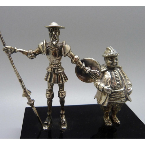 845 - A model of Don Quixote and Sancho Panza, silver covered figures, base 9cm wide