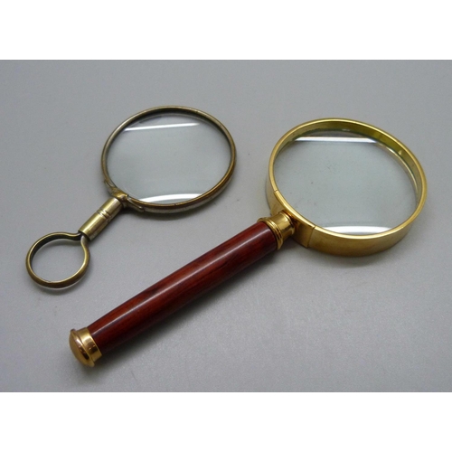 855 - Two magnifying glasses, one old silver