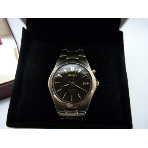 870 - A gentleman's Seiko Kinetic titanium loom watch and a lady's cased Rotary wristwatch