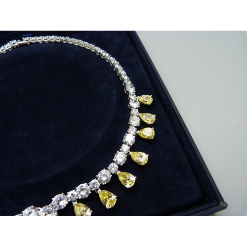 872 - A white and yellow stone necklace in original box by Attwood