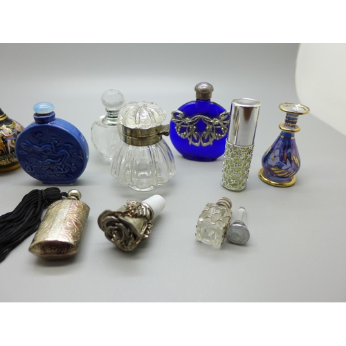 878 - Eleven glass and other scent bottles including oriental, and an extra stopper