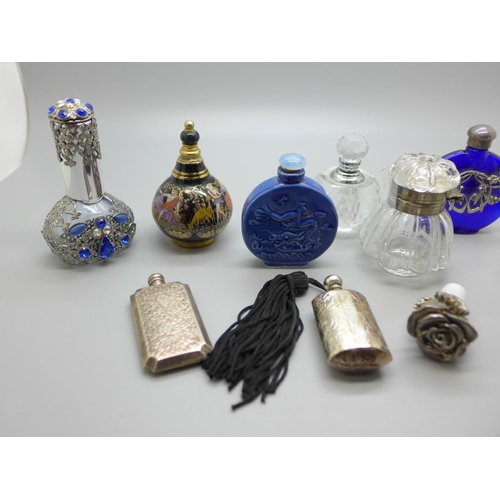 878 - Eleven glass and other scent bottles including oriental, and an extra stopper